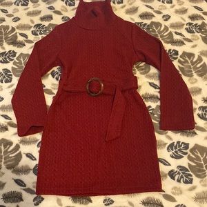 Beautiful dress for a girl size 5Y, color is burgundy, with belt.